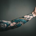 photo of left arm with tattoo