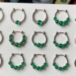top emerald nose hoop styles