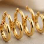 top 18k gold conch earrings