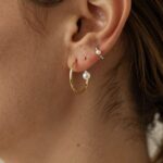Curated Ear Styling Starts With Better Materials—Not More Pieces quality over quantity jewelry