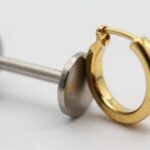 Titanium vs Gold for Sensitive Piercings: Which One Wins? titanium safer than gold