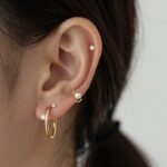 maintain balanced earring styles