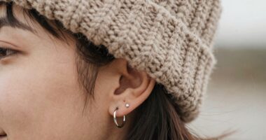 protect piercings with hats